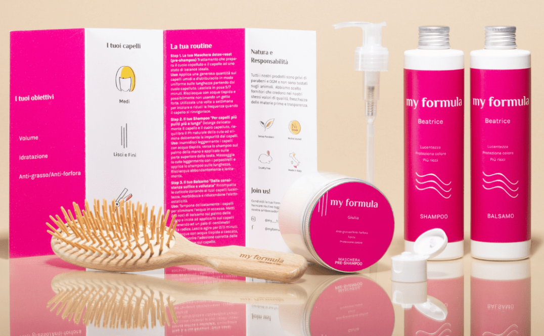 spazzola in legno e prodotti per capelli